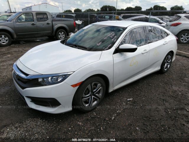 Photo 1 VIN: 19XFC2F55HE058009 - HONDA CIVIC SEDAN 