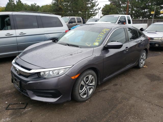 Photo 1 VIN: 19XFC2F55HE074887 - HONDA CIVIC LX 