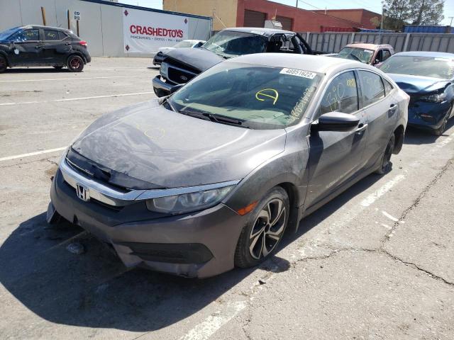 Photo 1 VIN: 19XFC2F55HE081144 - HONDA CIVIC LX 