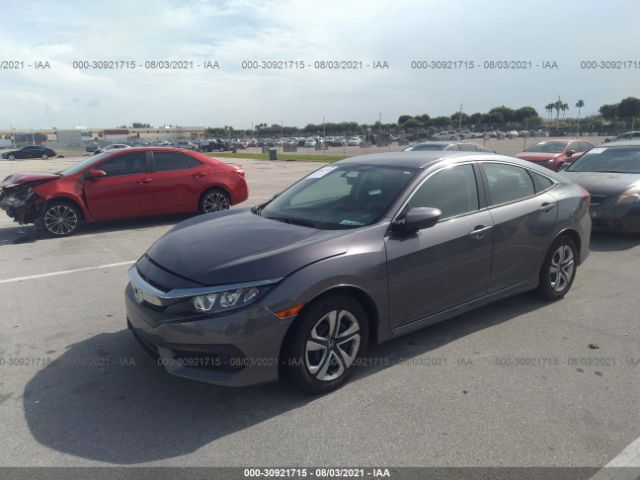 Photo 1 VIN: 19XFC2F55JE008619 - HONDA CIVIC SEDAN 