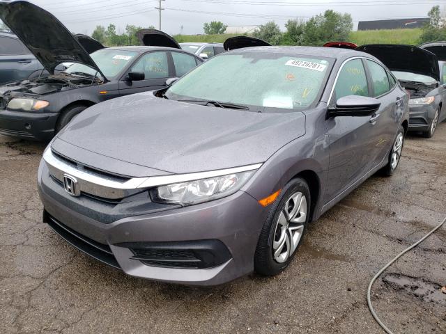 Photo 1 VIN: 19XFC2F55JE027655 - HONDA CIVIC LX 