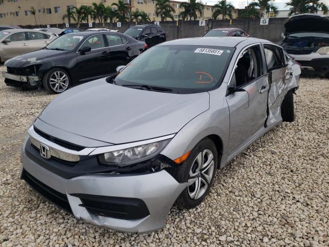 Photo 1 VIN: 19XFC2F55JE032998 - HONDA CIVIC LX 