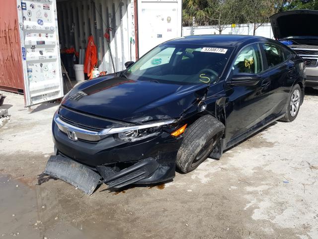 Photo 1 VIN: 19XFC2F56GE051584 - HONDA CIVIC LX 