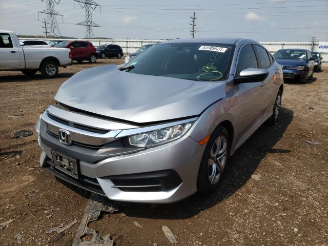 Photo 1 VIN: 19XFC2F56GE232040 - HONDA CIVIC LX 