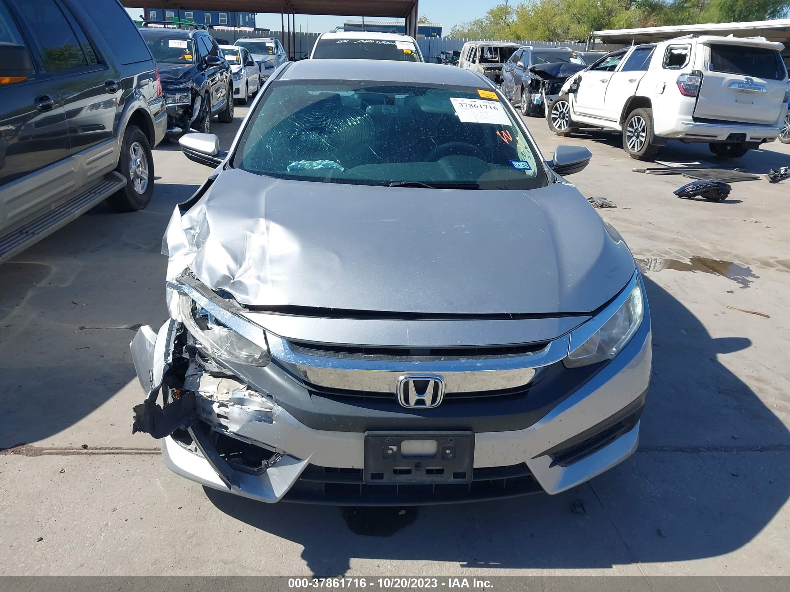 Photo 11 VIN: 19XFC2F56HE015105 - HONDA CIVIC LX 