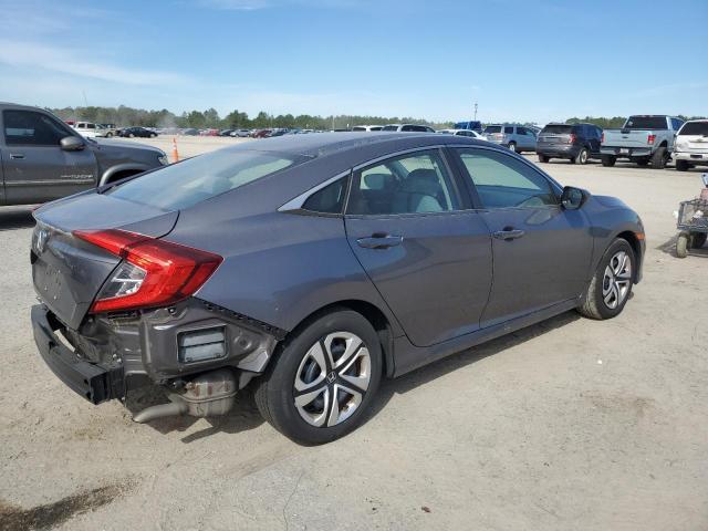 Photo 2 VIN: 19XFC2F56JE008497 - HONDA CIVIC LX 