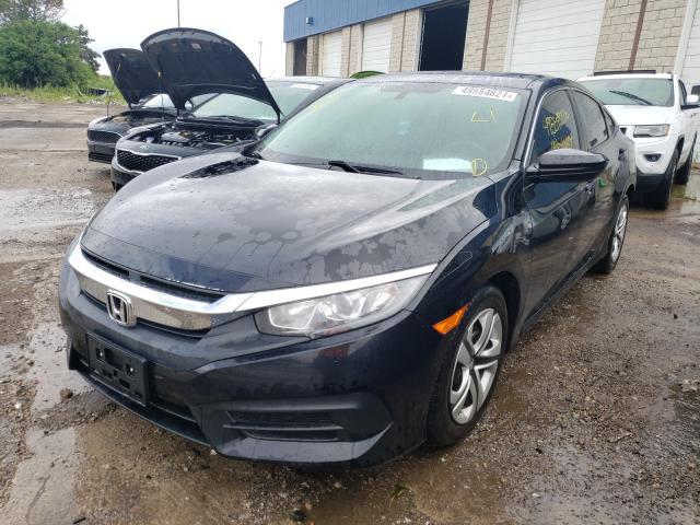 Photo 1 VIN: 19XFC2F56JE027194 - HONDA CIVIC LX 