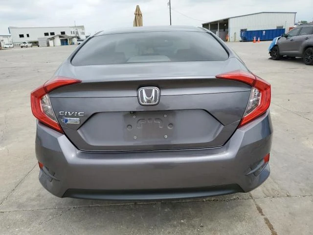 Photo 5 VIN: 19XFC2F57GE030064 - HONDA CIVIC LX 