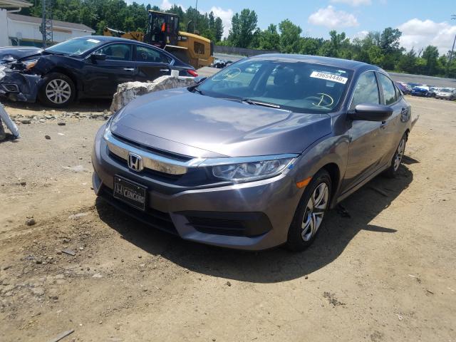 Photo 1 VIN: 19XFC2F57GE051917 - HONDA CIVIC LX 