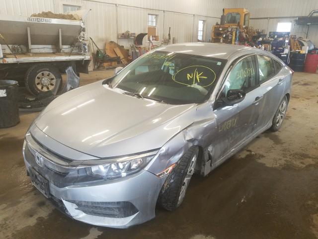 Photo 1 VIN: 19XFC2F57GE208894 - HONDA CIVIC LX 