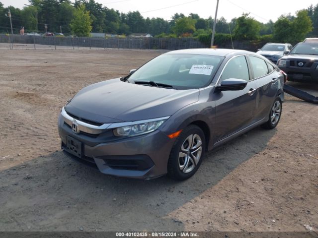 Photo 1 VIN: 19XFC2F57GE242298 - HONDA CIVIC 