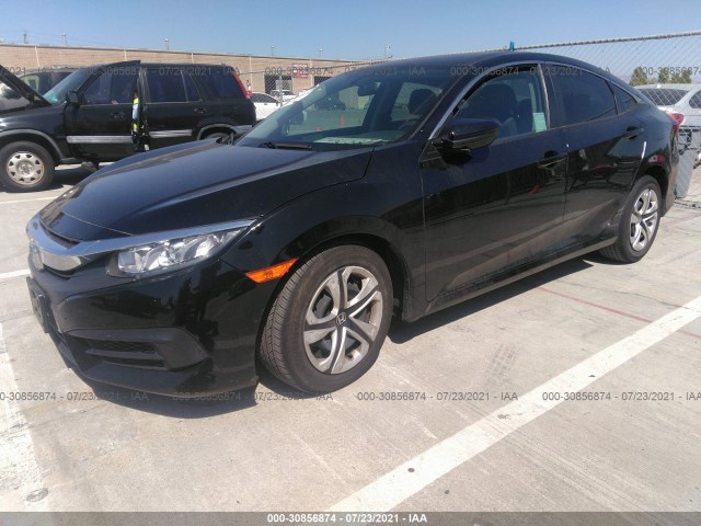 Photo 1 VIN: 19XFC2F57GE248828 - HONDA CIVIC SEDAN 