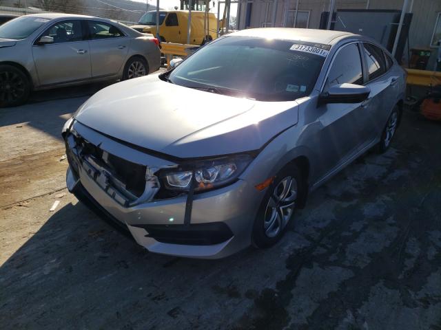 Photo 1 VIN: 19XFC2F57HE048937 - HONDA CIVIC LX 