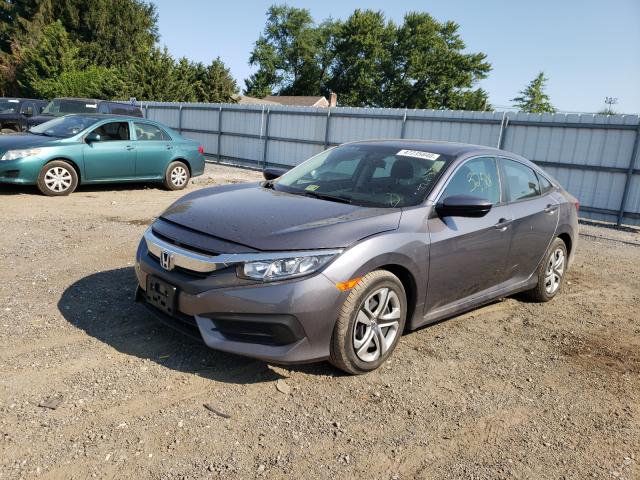 Photo 1 VIN: 19XFC2F57HE049800 - HONDA CIVIC LX 