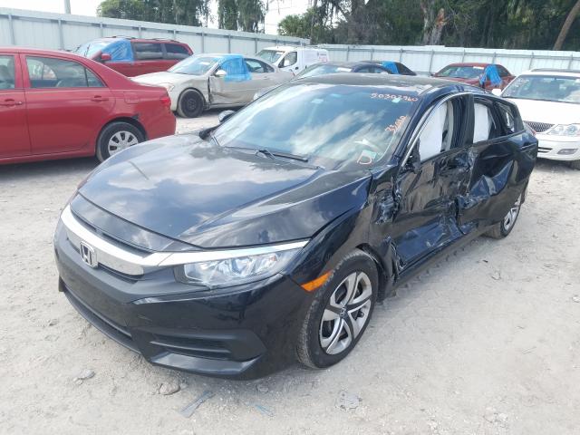 Photo 1 VIN: 19XFC2F57HE057198 - HONDA CIVIC LX 