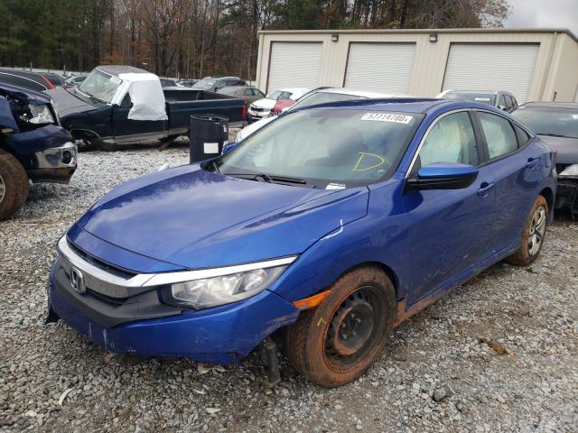 Photo 1 VIN: 19XFC2F57HE060098 - HONDA CIVIC LX 