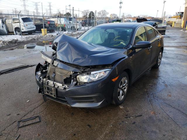 Photo 1 VIN: 19XFC2F57HE211750 - HONDA CIVIC LX 