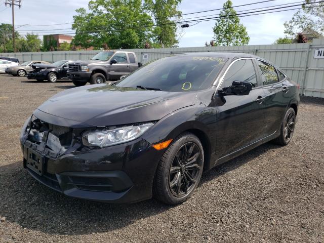 Photo 1 VIN: 19XFC2F57HE214597 - HONDA CIVIC LX 