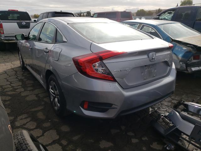 Photo 2 VIN: 19XFC2F57HE218634 - HONDA CIVIC LX 