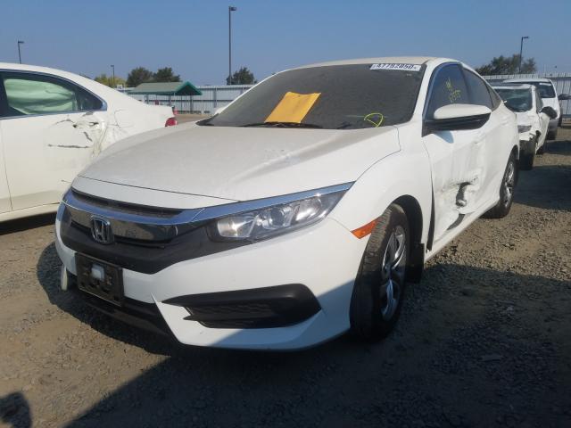 Photo 1 VIN: 19XFC2F57HE221744 - HONDA CIVIC LX 