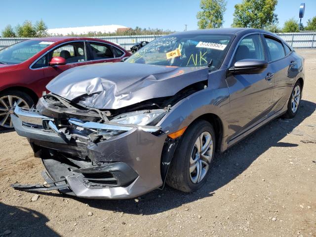 Photo 1 VIN: 19XFC2F57JE015250 - HONDA CIVIC LX 