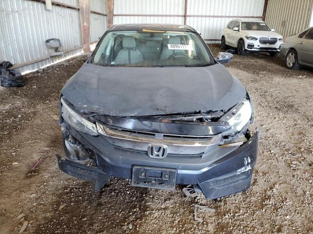 Photo 4 VIN: 19XFC2F57JE034025 - HONDA CIVIC LX 