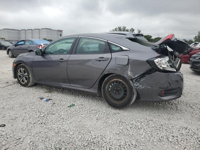 Photo 1 VIN: 19XFC2F57JE034462 - HONDA CIVIC LX 