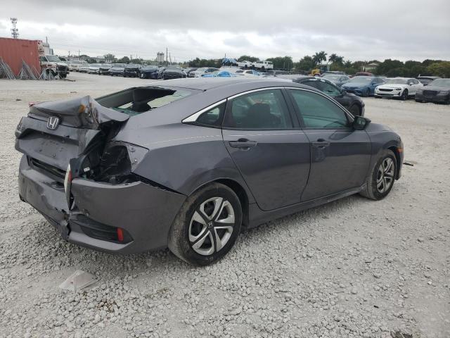 Photo 2 VIN: 19XFC2F57JE034462 - HONDA CIVIC LX 