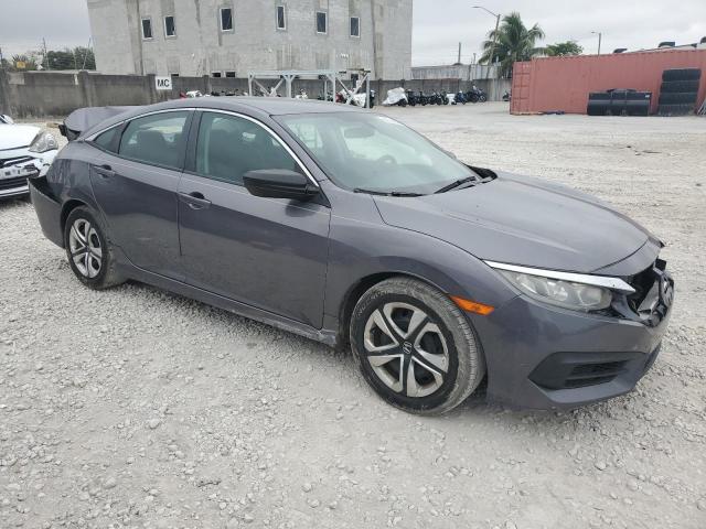 Photo 3 VIN: 19XFC2F57JE034462 - HONDA CIVIC LX 