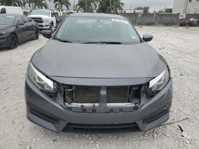 Photo 4 VIN: 19XFC2F57JE034462 - HONDA CIVIC LX 