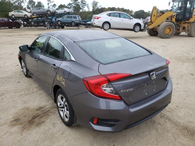 Photo 2 VIN: 19XFC2F57JE041766 - HONDA CIVIC LX 