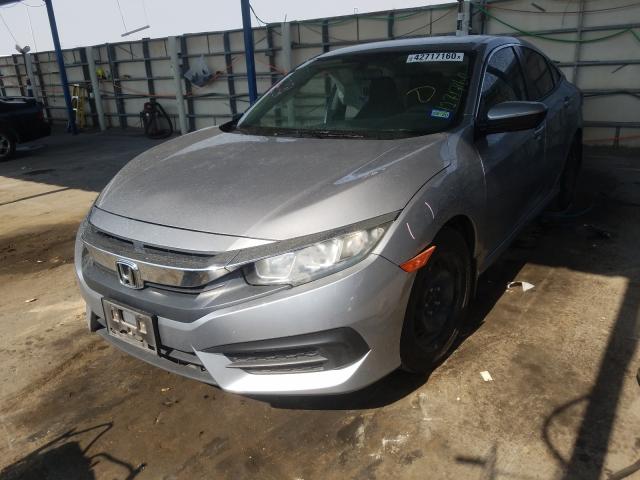 Photo 1 VIN: 19XFC2F58GE032485 - HONDA CIVIC LX 