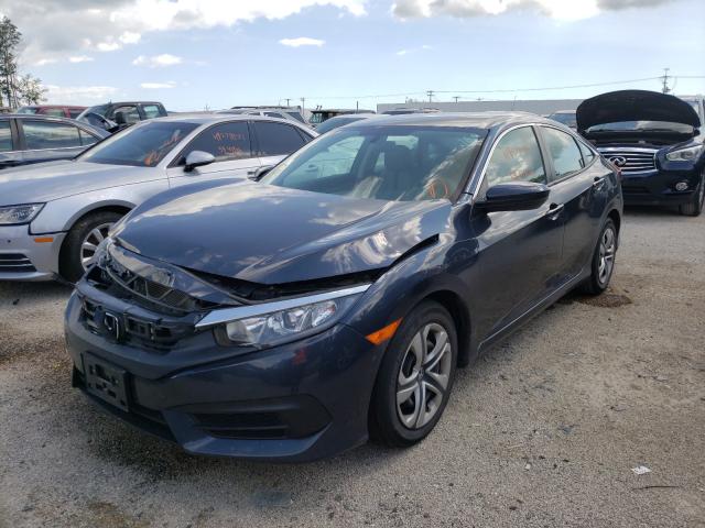 Photo 1 VIN: 19XFC2F58HE058764 - HONDA CIVIC LX 