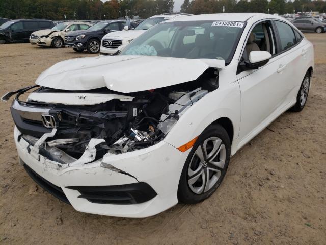 Photo 1 VIN: 19XFC2F58JE010056 - HONDA CIVIC LX 