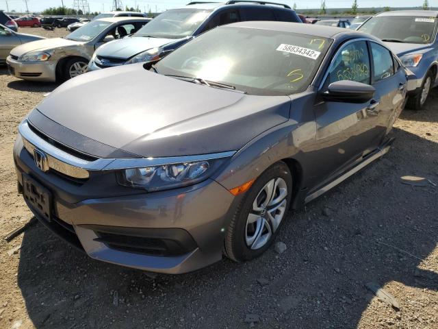 Photo 1 VIN: 19XFC2F58JE038052 - HONDA CIVIC LX 