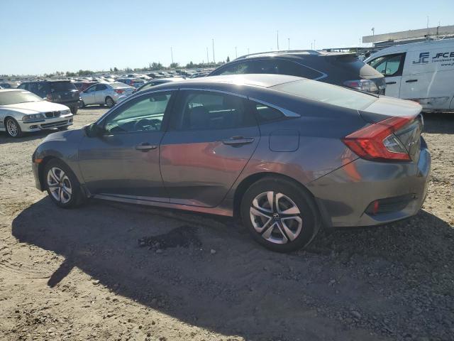 Photo 1 VIN: 19XFC2F58JE042070 - HONDA CIVIC LX 