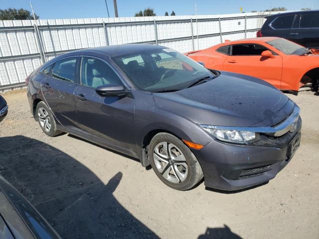 Photo 3 VIN: 19XFC2F58JE042070 - HONDA CIVIC LX 