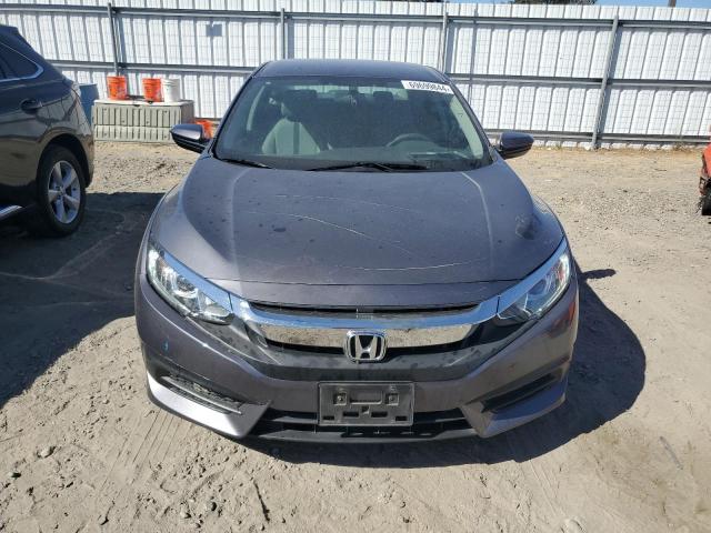 Photo 4 VIN: 19XFC2F58JE042070 - HONDA CIVIC LX 