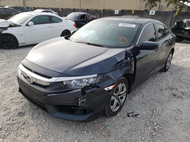 Photo 1 VIN: 19XFC2F58JE042098 - HONDA CIVIC LX 