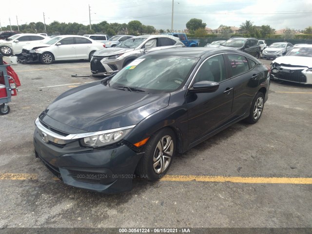 Photo 1 VIN: 19XFC2F59GE057699 - HONDA CIVIC SEDAN 