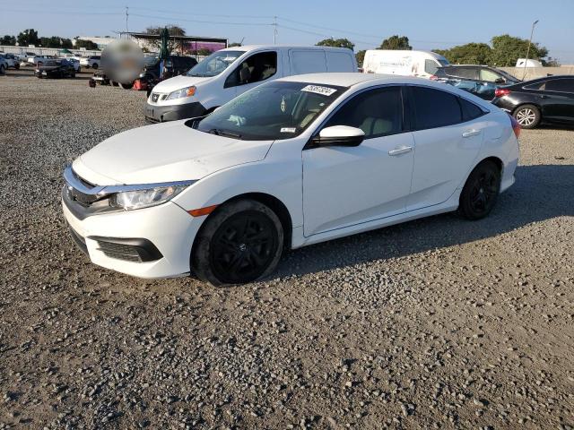 Photo 0 VIN: 19XFC2F59HE064136 - HONDA CIVIC LX 