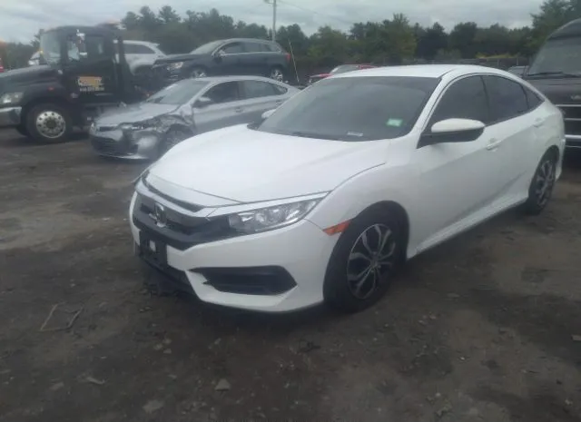 Photo 1 VIN: 19XFC2F59HE214617 - HONDA CIVIC SEDAN 