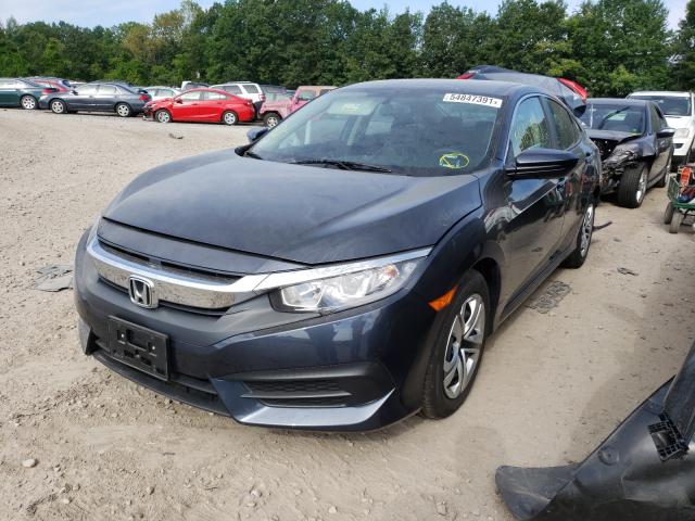 Photo 1 VIN: 19XFC2F59HE231207 - HONDA CIVIC LX 