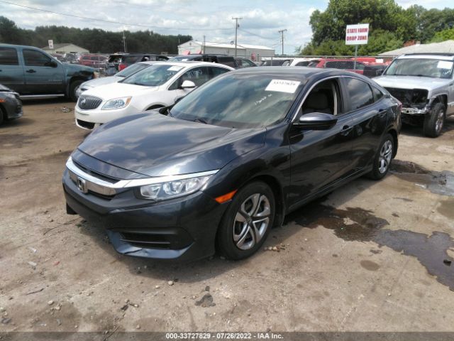 Photo 1 VIN: 19XFC2F59JE007490 - HONDA CIVIC SEDAN 