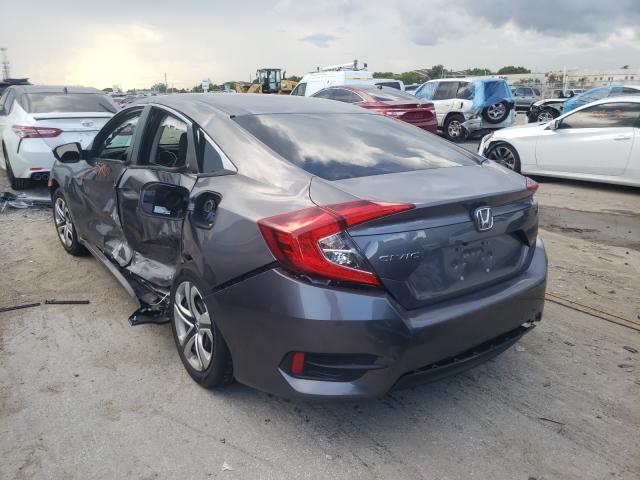 Photo 2 VIN: 19XFC2F59JE030249 - HONDA CIVIC LX 