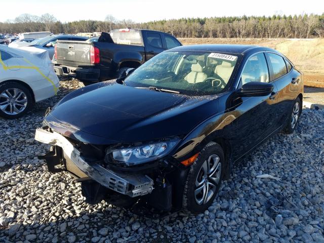 Photo 1 VIN: 19XFC2F5XGE018300 - HONDA CIVIC LX 