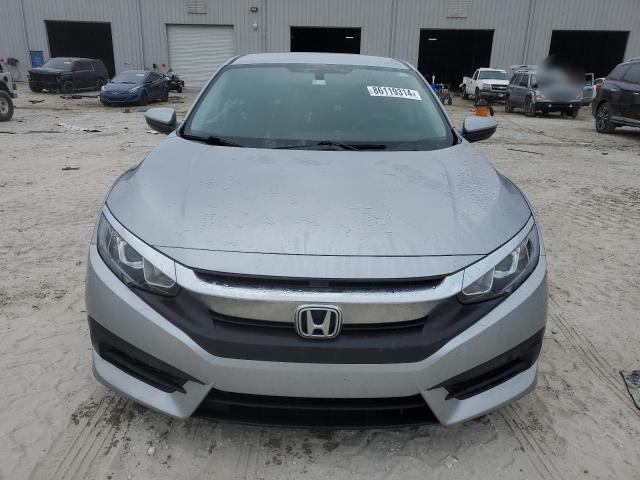 Photo 4 VIN: 19XFC2F5XGE022704 - HONDA CIVIC LX 