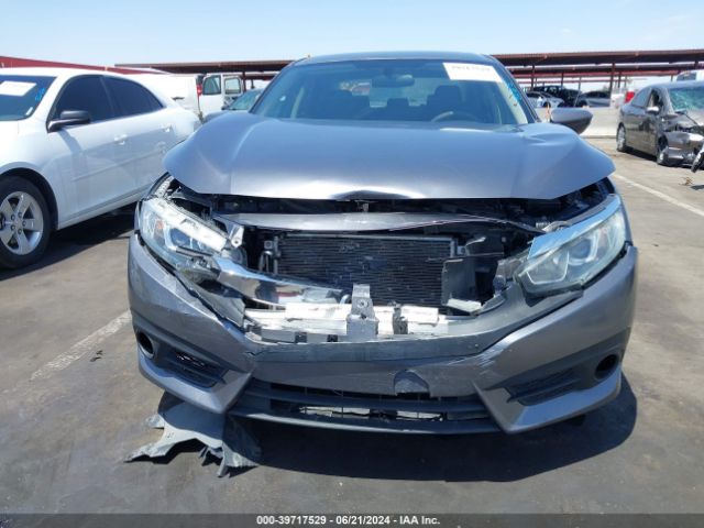 Photo 5 VIN: 19XFC2F5XGE030057 - HONDA CIVIC LX 