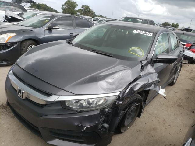 Photo 1 VIN: 19XFC2F5XGE042175 - HONDA CIVIC LX 