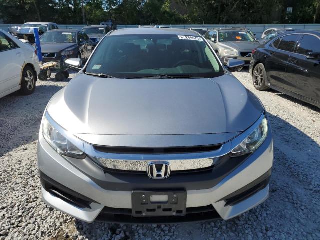 Photo 4 VIN: 19XFC2F5XGE052530 - HONDA CIVIC LX 